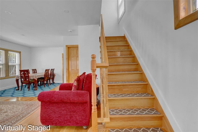 11511 173rd St, Addisleigh Park, NY 11434 - staircase featuring wood finished floors and baseboards