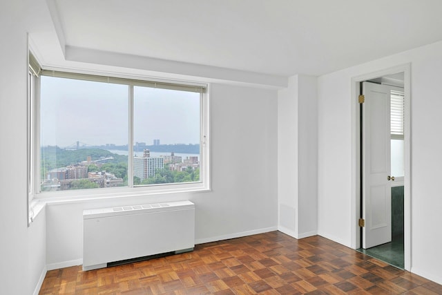 3333 Henry Hudson Pkwy # 23Ef, Bronx, NY 10463 - spare room with radiator, healthy amount of natural light, and a view of city