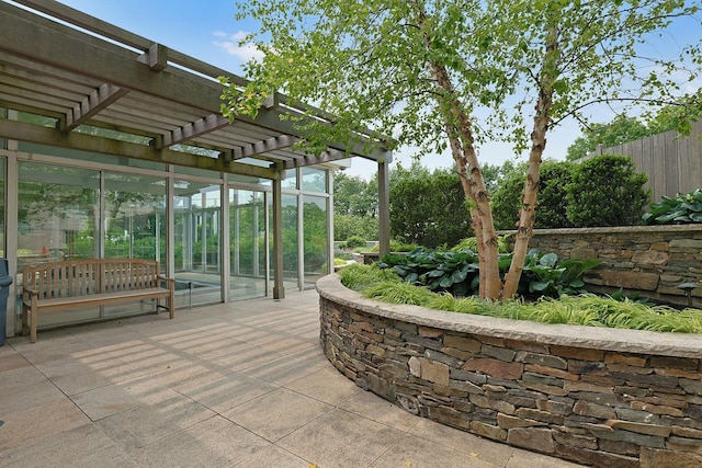 3333 Henry Hudson Pkwy # 23Ef, Bronx, NY 10463 - view of patio / terrace featuring a pergola and a sunroom
