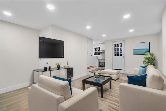 504 Van Nest, Bronx, NY 10460 - living area featuring baseboards, recessed lighting, light wood-type flooring, and a fireplace