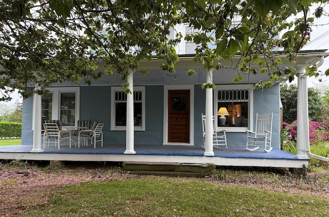 630 New Suffolk Rd, Cutchogue, NY 11935 - back of property featuring a porch