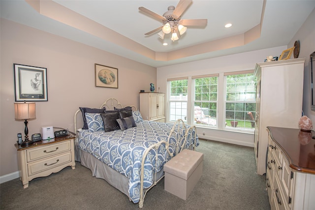 42 Kimberly Dr Unit 42, Westhampton, NY 11977 - bedroom featuring carpet flooring, a tray ceiling, recessed lighting, baseboards, and a ceiling fan
