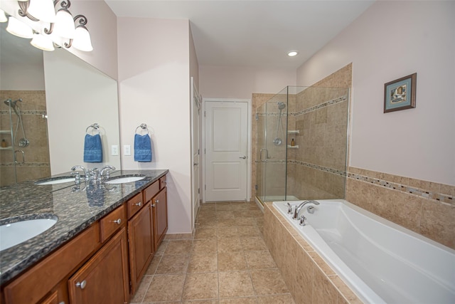 42 Kimberly Dr Unit 42, Westhampton, NY 11977 - bathroom with a stall shower, a bath, double vanity, and a chandelier