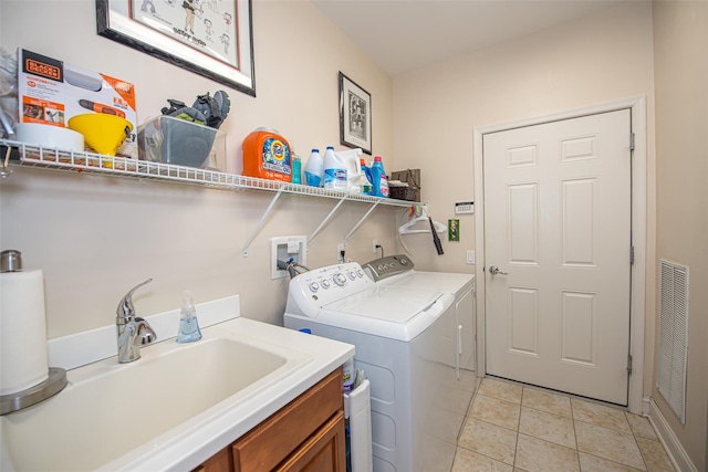 42 Kimberly Dr Unit 42, Westhampton, NY 11977 - laundry room featuring independent washer and dryer and cabinet space