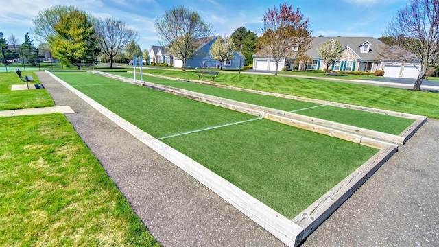42 Kimberly Dr Unit 42, Westhampton, NY 11977 - surrounding community with a bocce ball area, a yard, and a residential view