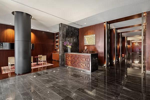 reception featuring wood walls