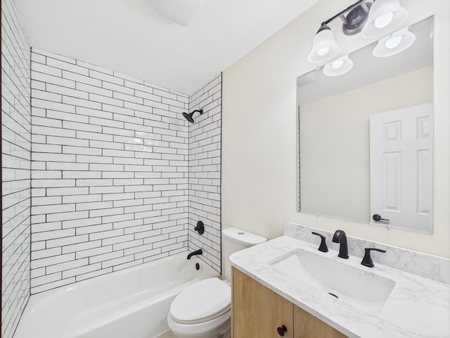 bathroom featuring toilet,  shower combination, and vanity