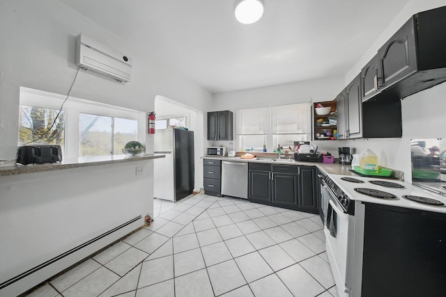 5404 State Route 55, Liberty, NY 12754 - kitchen with stainless steel appliances, a baseboard heating unit, a wall unit AC, light countertops, and light tile patterned floors