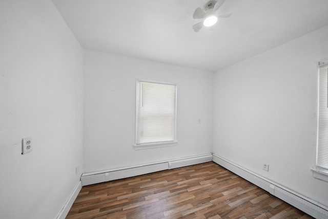 5404 State Route 55, Liberty, NY 12754 - empty room featuring wood finished floors, a ceiling fan, baseboards, and baseboard heating