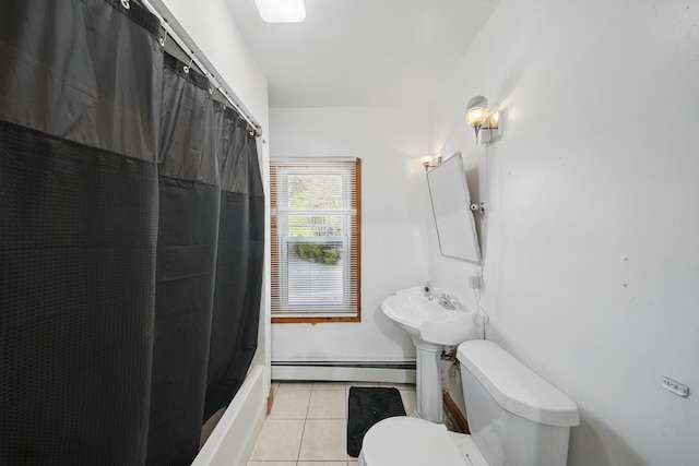 5404 State Route 55, Liberty, NY 12754 - bathroom with a baseboard radiator, tile patterned floors, toilet, shower / tub combo with curtain, and a sink