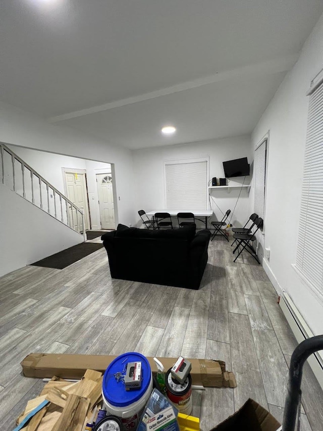 5404 State Route 55, Liberty, NY 12754 - living room with wood finished floors, stairway, and recessed lighting