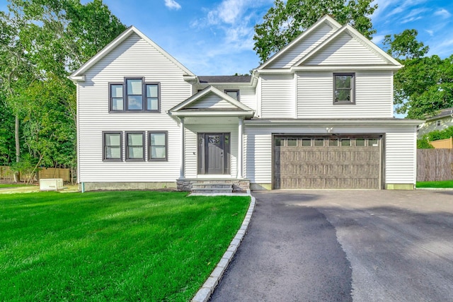 223 Townline Rd, Commack, NY 11725 - view of front of house with an attached garage and asphalt driveway