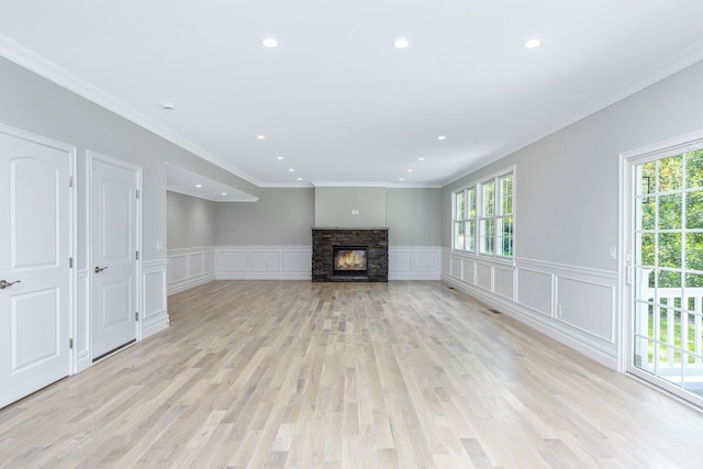 223 Townline Rd, Commack, NY 11725 - unfurnished living room with healthy amount of natural light, recessed lighting, a fireplace, a decorative wall, and a wainscoted wall