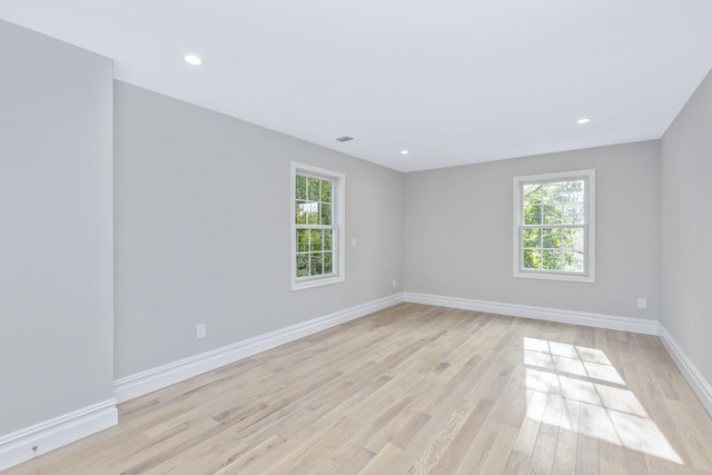 223 Townline Rd, Commack, NY 11725 - empty room featuring light wood finished floors, baseboards, and recessed lighting