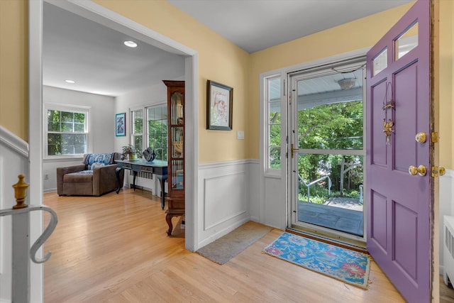 10 Bay Dr W, Huntington Bay, NY 11743 - entrance foyer featuring wainscoting and light wood finished floors