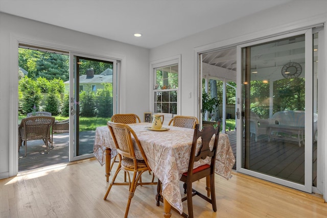 10 Bay Dr W, Huntington Bay, NY 11743 - dining space with light wood-style flooring and recessed lighting