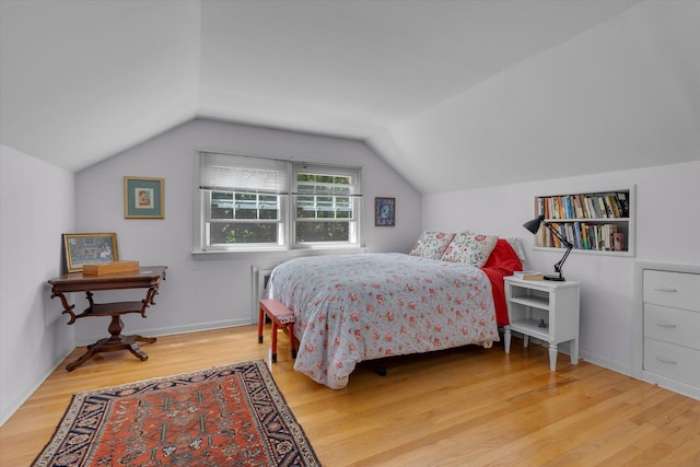 10 Bay Dr W, Huntington Bay, NY 11743 - bedroom with wood finished floors and vaulted ceiling