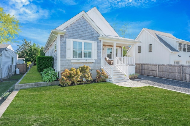 view of front of home with a porch and stairs