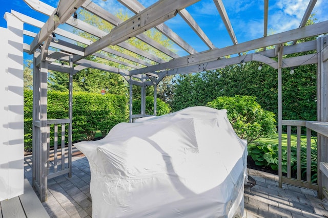 wooden terrace with a pergola