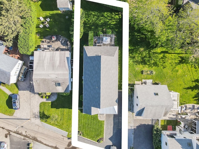 aerial view of property and surrounding area with property boundaries highlighted