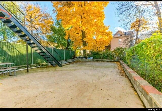 832 E 224th St, Bronx, NY 10466 - view of patio / terrace featuring fence and stairway