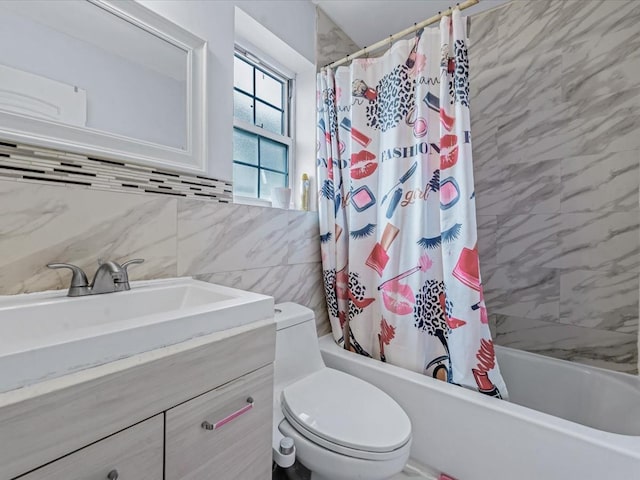 full bath featuring shower / bath combination with curtain, toilet, tile walls, and vanity