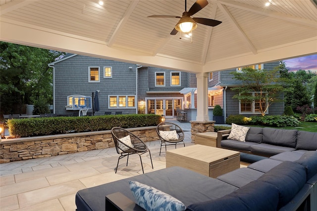 15 Wagamon Dr, Woodbury, NY 11797 - patio terrace at dusk featuring outdoor lounge area, a patio, ceiling fan, and a gazebo