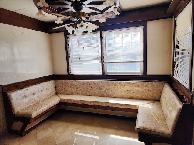 unfurnished room featuring a ceiling fan and tile patterned flooring