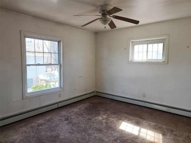 empty room with carpet, a ceiling fan, and a baseboard radiator