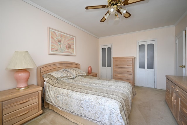 bedroom with light colored carpet, ornamental molding, and a ceiling fan