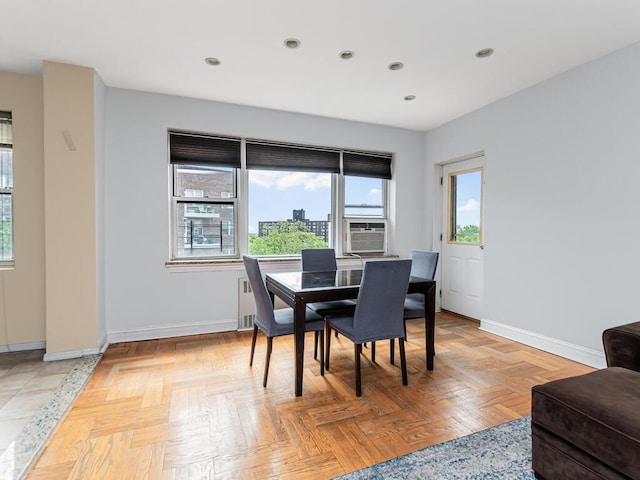 dining space with baseboards and recessed lighting