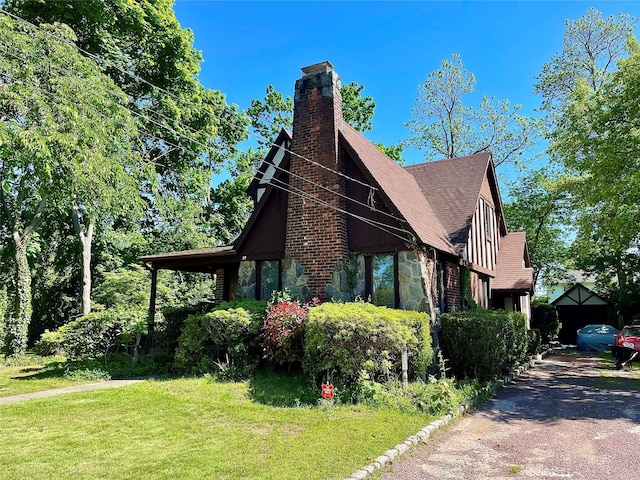 59 Sunset Rd, Bay Shore, NY 11706 - view of side of home with stone siding, a chimney, a lawn, and a shingled roof