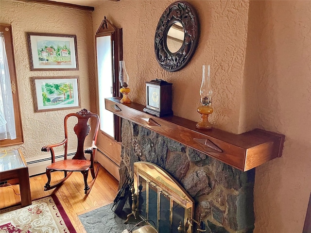 59 Sunset Rd, Bay Shore, NY 11706 - living area featuring a textured wall and wood finished floors