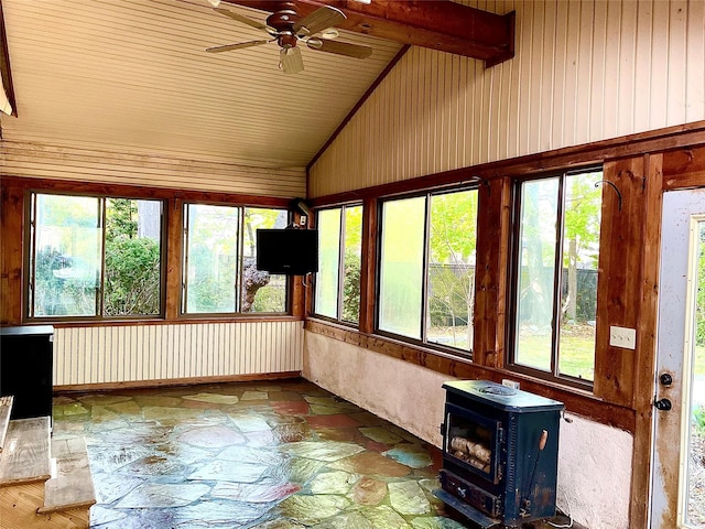 59 Sunset Rd, Bay Shore, NY 11706 - unfurnished sunroom featuring a wood stove, high vaulted ceiling, stone finish floors, wooden ceiling, and wooden walls