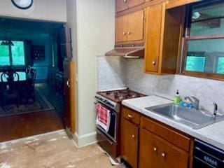 59 Sunset Rd, Bay Shore, NY 11706 - kitchen with gas range oven, extractor fan, black dishwasher, brown cabinetry, and light countertops