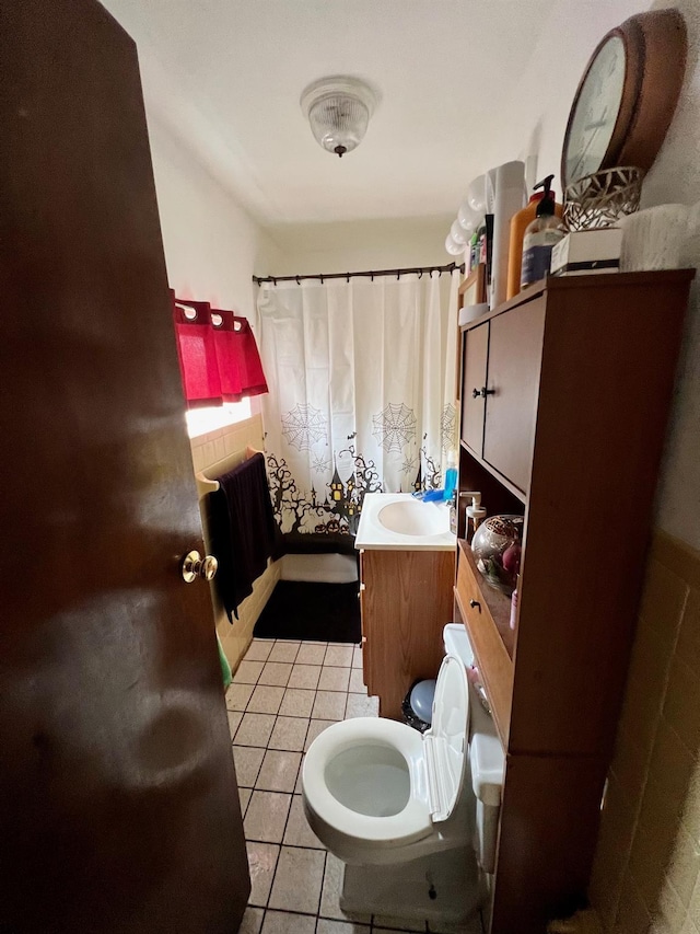 60-85 55th St, Maspeth, NY 11378 - bathroom with tile patterned floors, toilet, vanity, and curtained shower