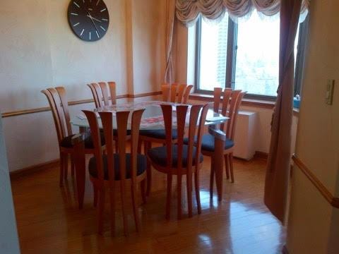 dining space with light wood-style flooring