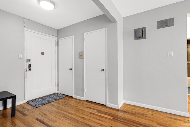 67-30 Clyde St Unit 6W, Forest Hills, NY 11375 - foyer featuring light wood finished floors and baseboards
