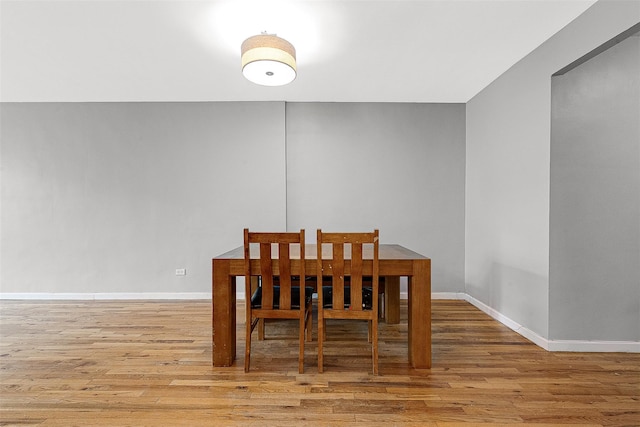 67-30 Clyde St Unit 6W, Forest Hills, NY 11375 - dining area featuring wood finished floors and baseboards