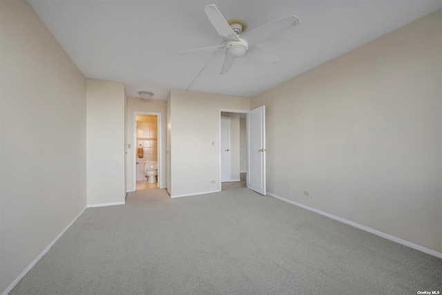 2 Bay Club Dr Unit 3Z3, Bayside, NY 11360 - unfurnished bedroom featuring baseboards, light carpet, and a ceiling fan