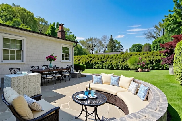 view of patio featuring an outdoor living space and outdoor dining space