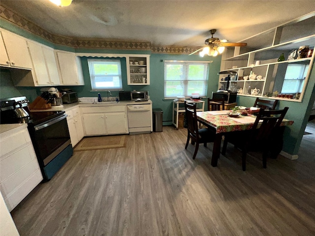 23 Hawkins Path, Coram, NY 11727 - kitchen featuring white dishwasher, electric stove, a sink, dark wood finished floors, and ceiling fan
