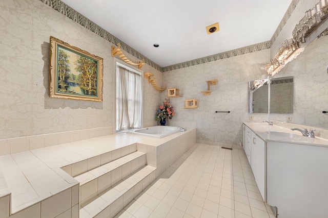 full bathroom with a bath, tile patterned floors, and double vanity