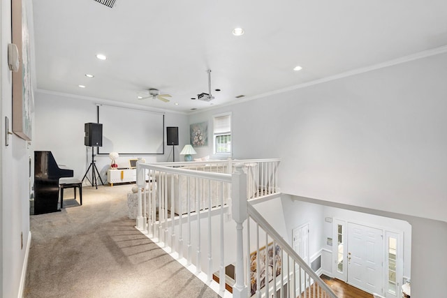 hall featuring an upstairs landing, recessed lighting, ornamental molding, carpet, and baseboards