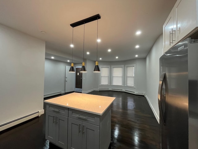 563 E 3rd St, Mount Vernon, NY 10553 - kitchen with freestanding refrigerator, a baseboard heating unit, recessed lighting, baseboards, and gray cabinetry