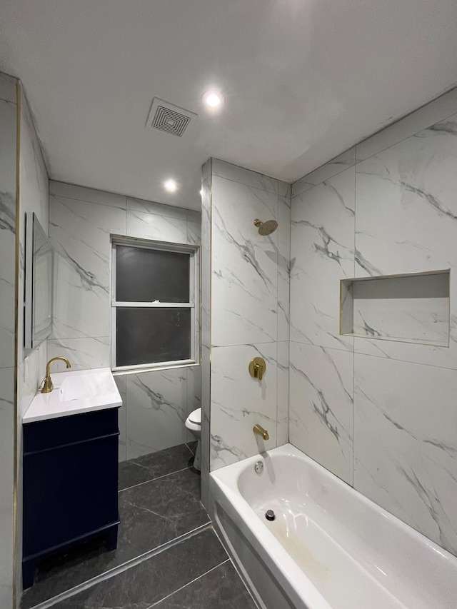 563 E 3rd St, Mount Vernon, NY 10553 - bathroom featuring toilet, marble finish flooring, vanity, tub / shower combination, and recessed lighting