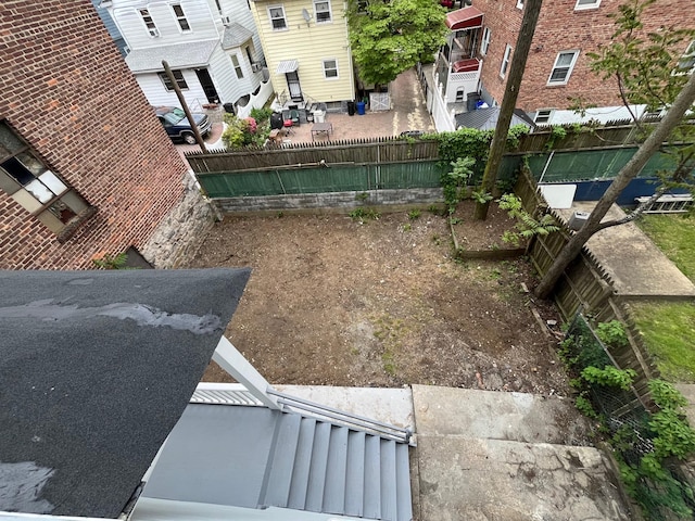 563 E 3rd St, Mount Vernon, NY 10553 - fenced backyard with a patio