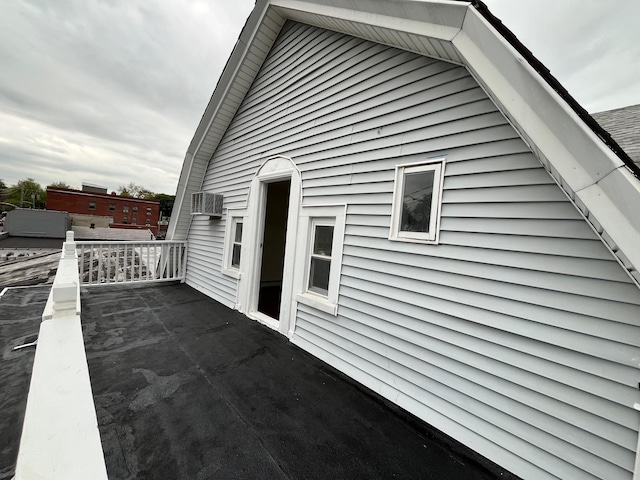 563 E 3rd St, Mount Vernon, NY 10553 - view of side of home featuring an AC wall unit