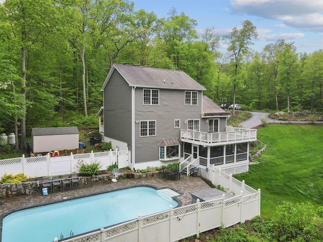 25 Crest Rd, Cold Spring, NY 10516 - rear view of property with a wooden deck, stairway, a wooded view, a patio, and roof with shingles