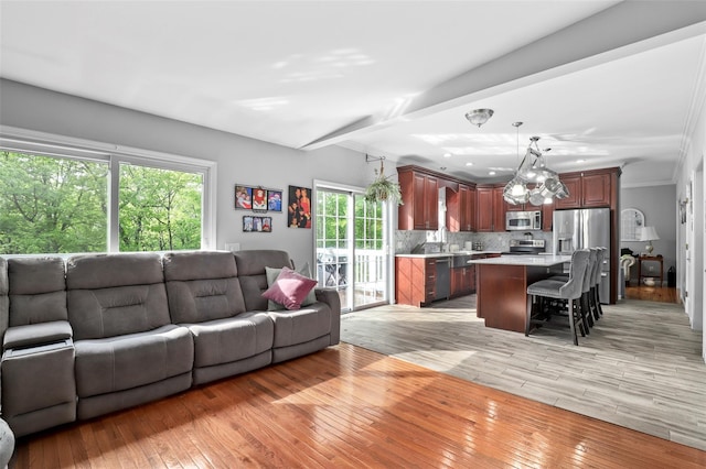 25 Crest Rd, Cold Spring, NY 10516 - living room with light wood-type flooring and ornamental molding